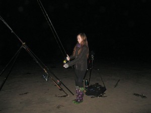 Katie fishes from Whitesands beach on a calm October night