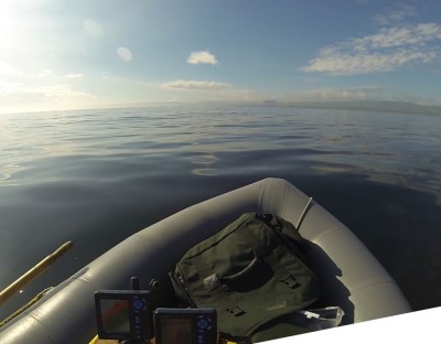 Warm sunshine, calm waters - a perfect way to spend a morning fishing from a small inflatable