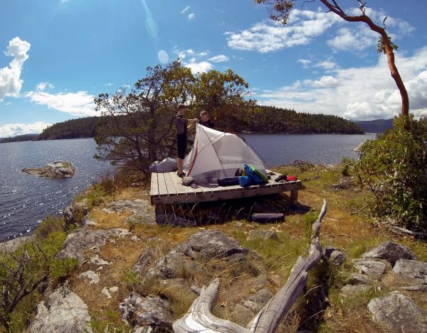 A superb spot for a tent, with the sea on three sides and the sun overhead.