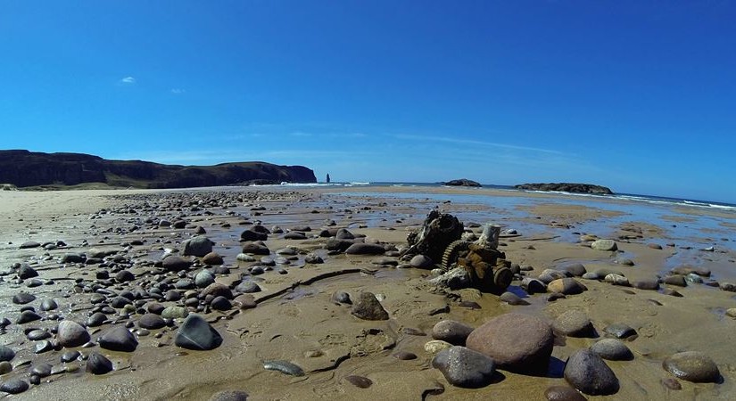 Sandwood Beach with Spitfire engine in foreground