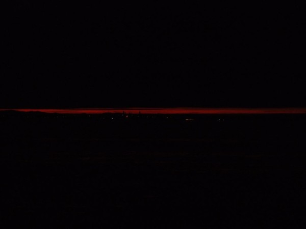 Dusk falls over St Andrews as we head back to harbour