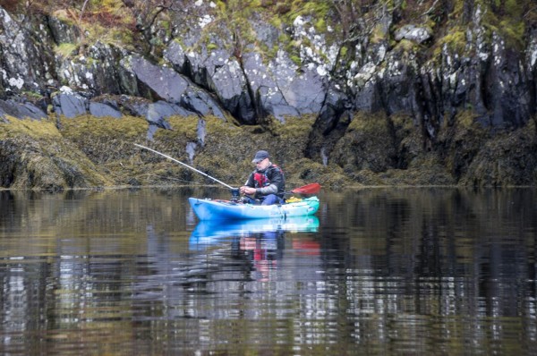 Pollack fishing from a kayak, tucked close in under the cliffs at Loch Leven