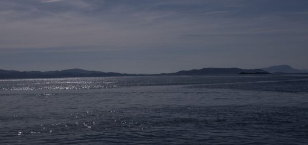 Perfect weather for a day afloat in March. A view over the islands to the south of the Firth of Lorne.