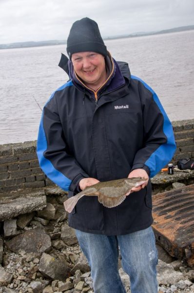 Ian with the best flounder of the trip, something like 1lb 6 or 7oz