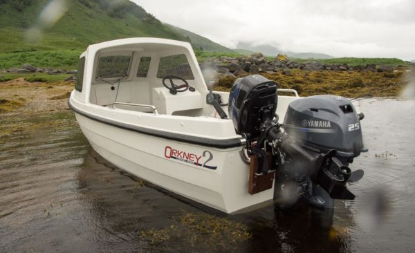 A view from astern of the Orkney Longliner2 showing the main and auxiliary outboards