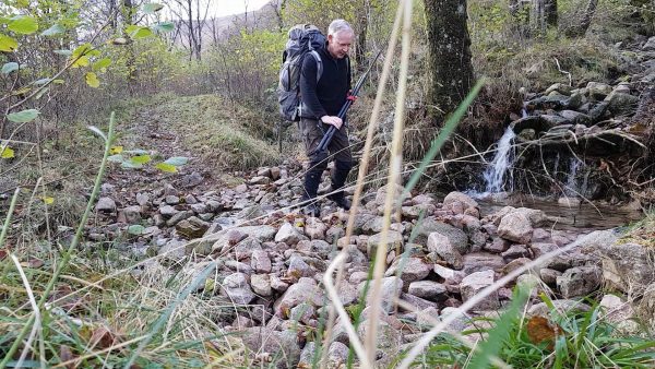 Fording a small burn along the track between Glen Etive and Barrs.