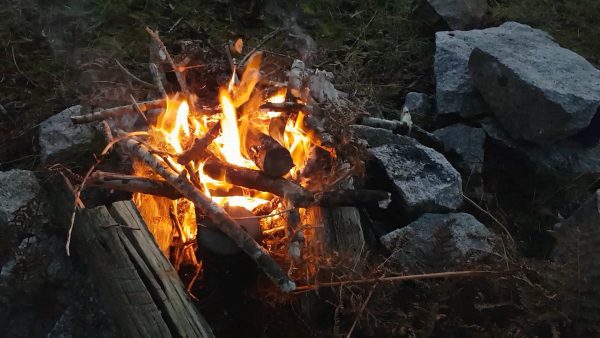 Campfire catches hold - a welcome sight on a cold November evening