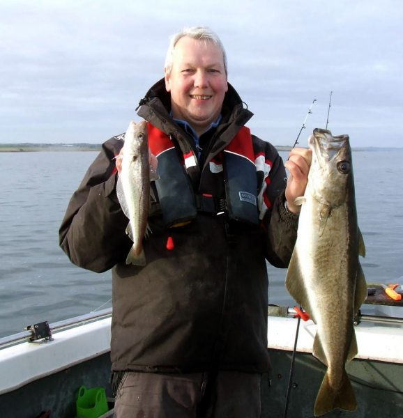 Little and large - a pollack and a whiting from St Andrews