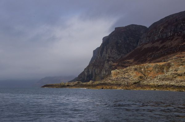 Cliffs guard the entrance to Loch Buie, Isle of Mull, and reach over 1000 feet high