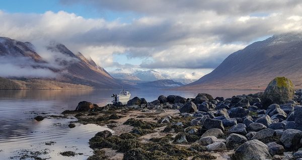 A jaw-dropping view along Loch Etive as the sun pokes through the early morning cloud