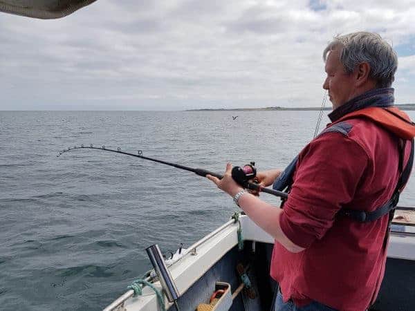 Ian fishing a baited rig for codling off St Andrews