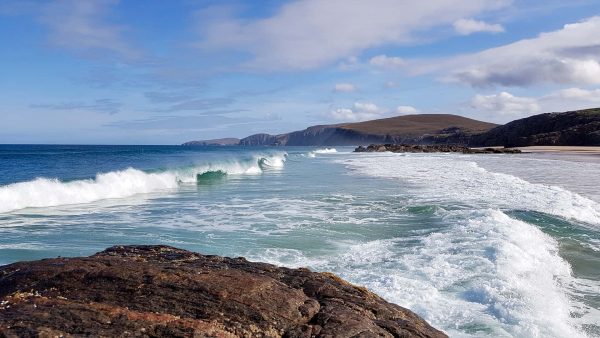 A lovely surf pounds in to Sandwood beach on a clear September morning in NW Scotland