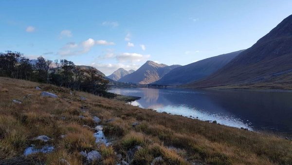 Early morning sun picks up the mountains at the head of Loch Etive