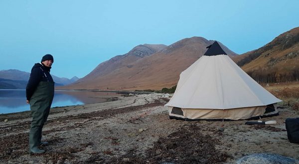 A large tent and a sandy beach don't make the best companions, but a few rocks will counter any winds tonight