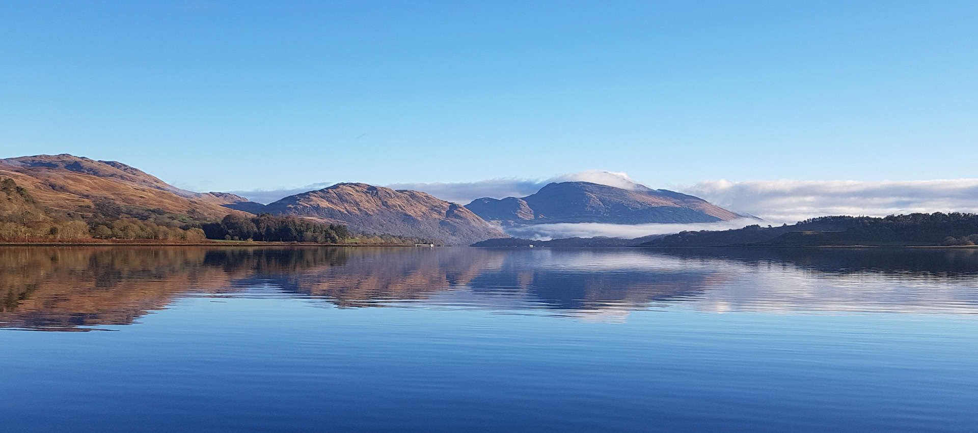 A perfect winters day on Loch Etive, looking towards the snow capped Ben Cruachan