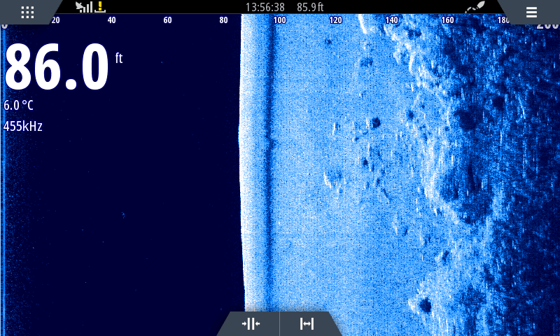 A sidescan image showing the base of rocky outcrops on Loch Leven, with boulders half sunk in the glacial mud