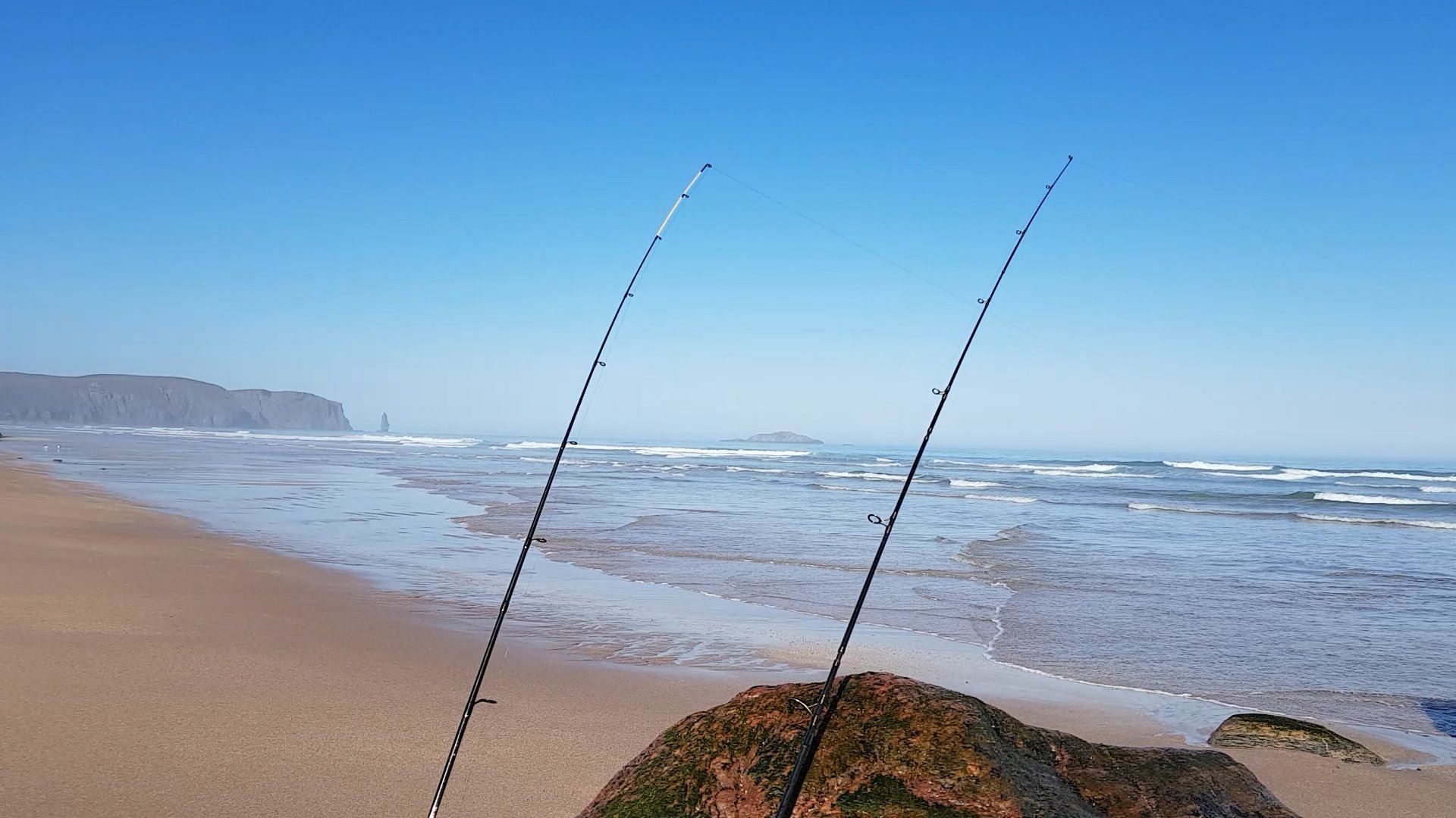 Fishing light in shallow surf near Sandwood Bay, NW Scotland