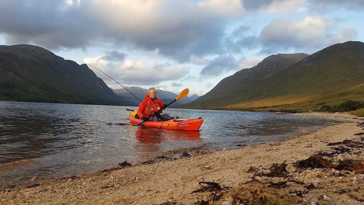 My kayak glides in to the beach at my campsite